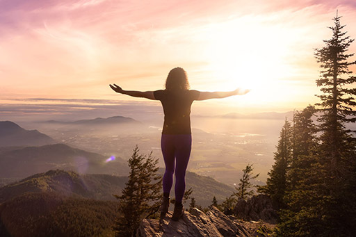Nature-Person-on-mountain-peak